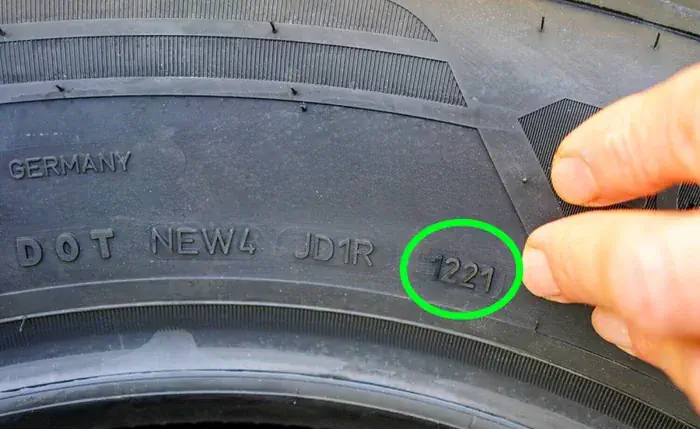 The image is showing the week and year of manufacture of a tire on the sidewall